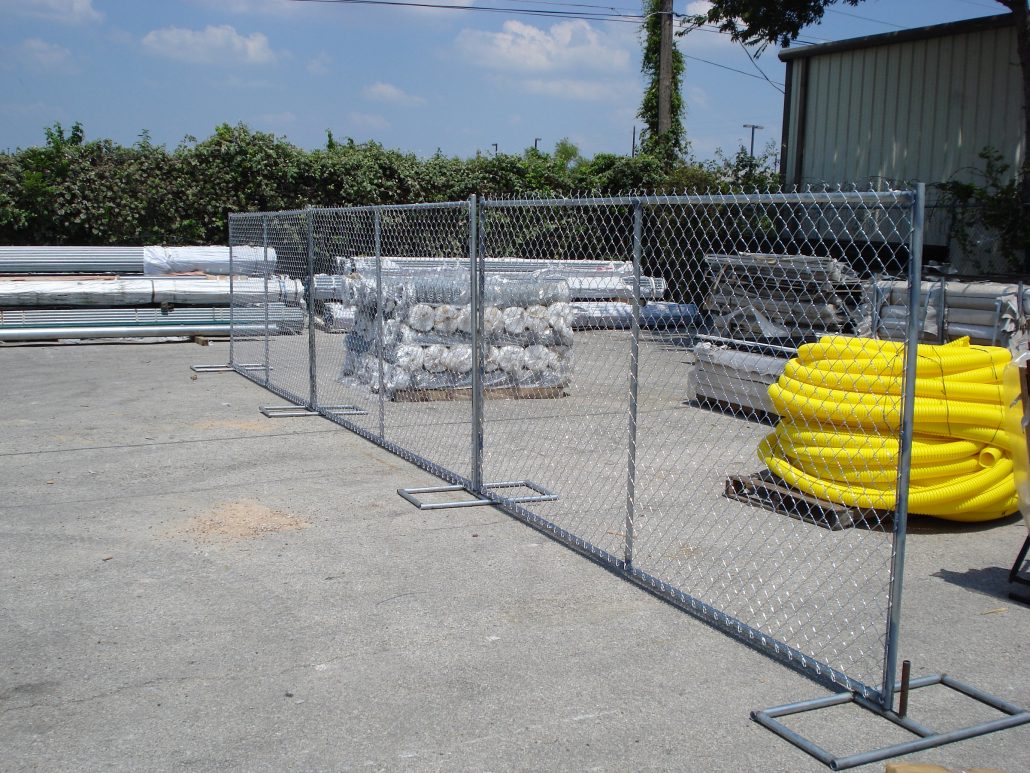 Chain-link temporary fence panels staged and ready for delivery